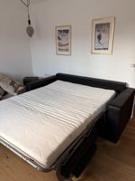 Sofa bed black leather look like new condition