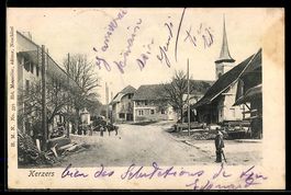 AK Kerzers, Straßenpartie mit Kirche