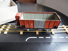 Buco 8660 Güterwagen mit Bremshaus in Box