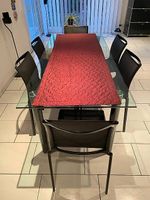 Design-Glastisch mit 6 Stühlen