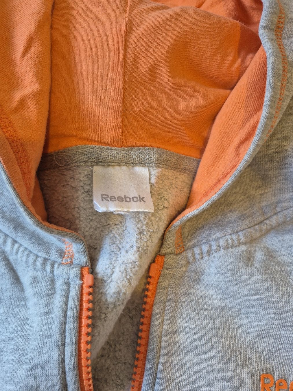 Giacche: Sweat à capuche Reebok gris orange fermeture éclair taille S – Usato da St-Pierre-Clages venduto da _RV 2