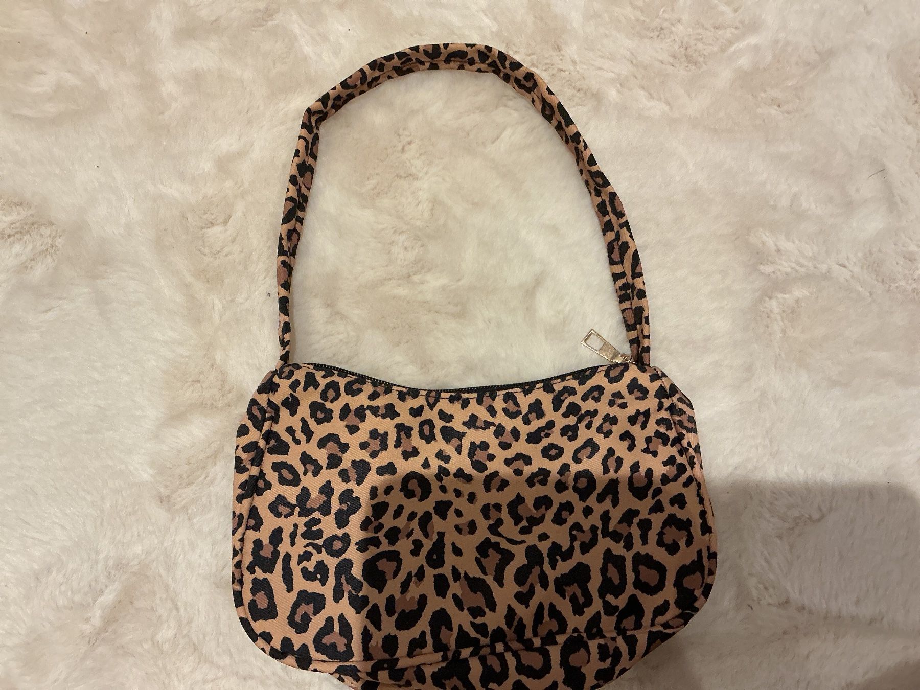 Borse & Zaini: Handtasche mit Leopardenmuster neuwertig – Nuovo (secondo la descrizione) da Zürich venduto da vg01
