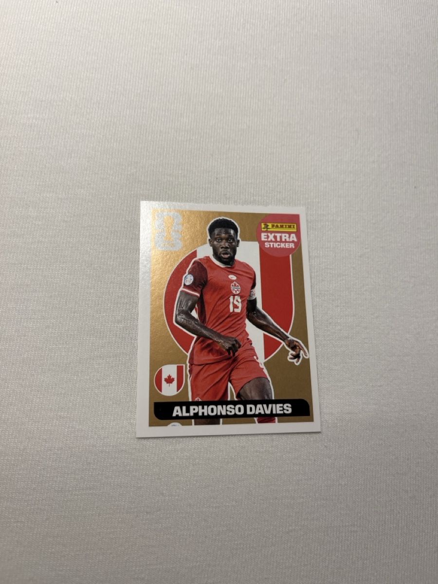 Panini Carte collezionabili: Alphonso Davies bronze – Nuovo e nell'imballaggio originale da Zug venduto da Haegito