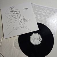 Strange  – Souvenir Album