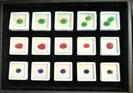 Coffret émeraudes rubis saphirs 50.33 ct - CERTIF. 2'446.-Fr
