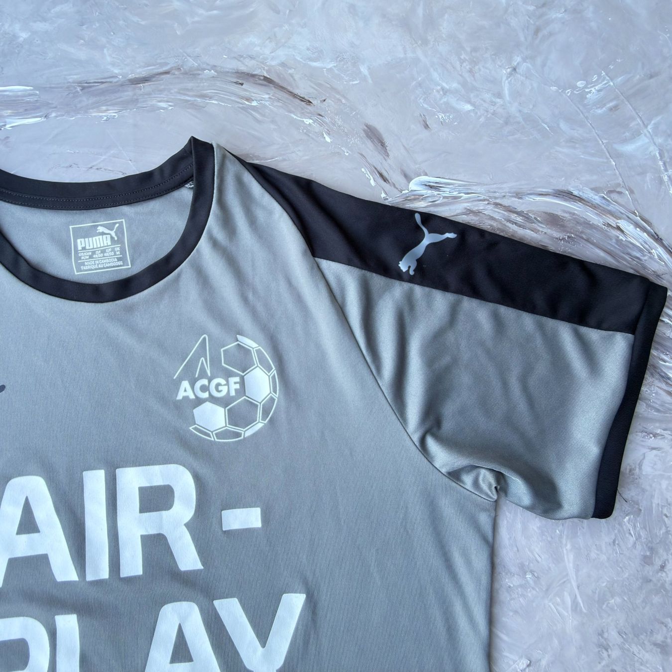 Puma T-shirt: T-shirt Puma ACGF Fair Play gris – Usato da Thônex venduto da Suisse.Shopping 4