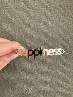 Silberfarbenes Armband mit Schriftzug "Happiness" top!