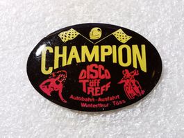 Ansteckpin 77: Champion