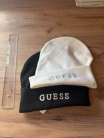 Lot de 2 bonnets Guess noir et blanc