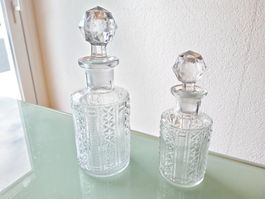 Duo d'anciens flacons à parfum en cristal