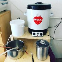 Weck Einkochautomat mit Verpackung und Einlegegitter