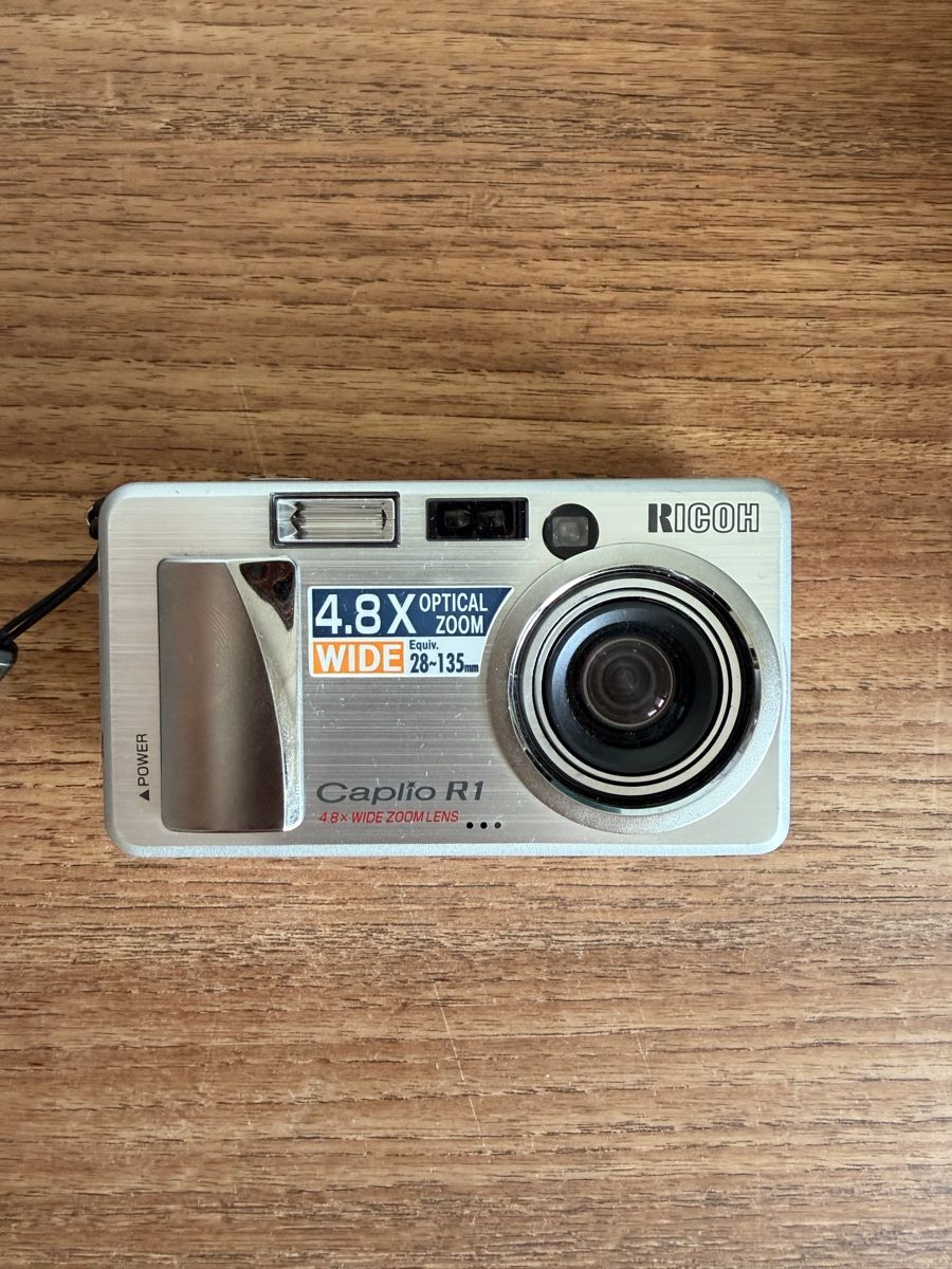 Ricoh Kamera: Ricoh Capilo R1 28-135mm  – Gebraucht aus Winterthur von Silvision