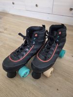 Rollschuhe Grösse 38 schwarz guter Zustand