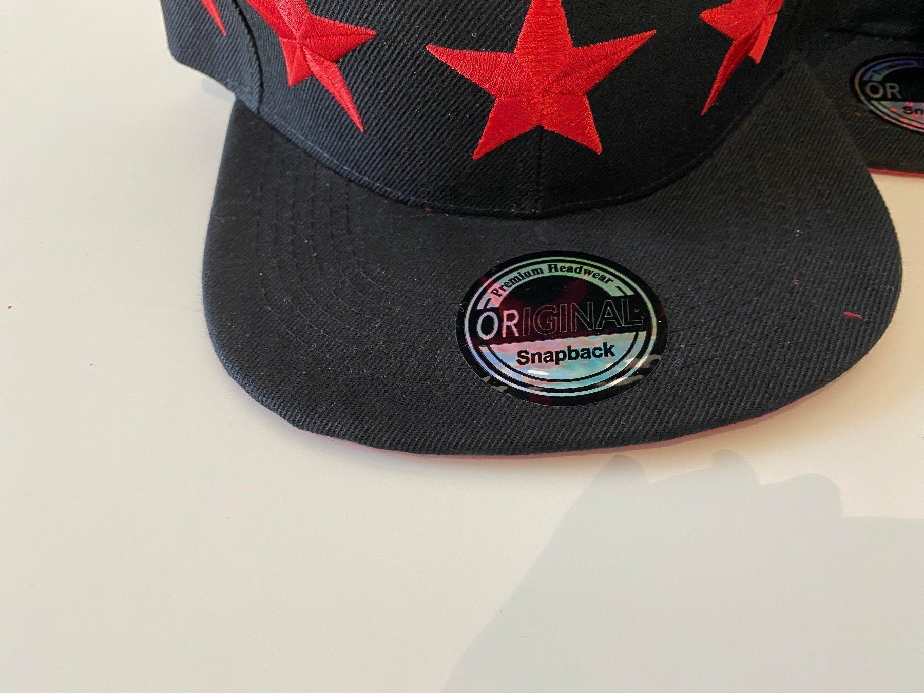 Copricapi, berretti & cappellini: 4 Basecaps Snapback N&Y Trading Corporation - Restposten – Nuovo e nell'imballaggio originale da Eschenbach SG venduto da Sums 1