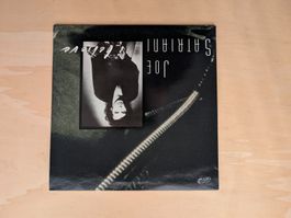 Joe Satriani – I Believe  UK 90