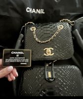 Authentic Chanel Backpack Black Leather & Python