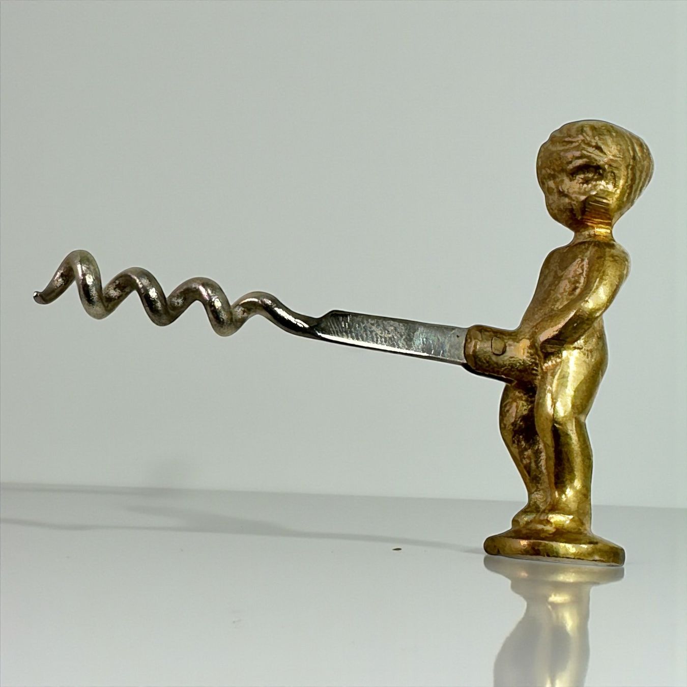 Flaschenöffner & -verschlüsse: Tire-bouchon garçon bronze doré et acier inoxydable – Gebraucht aus Morges von Novantica