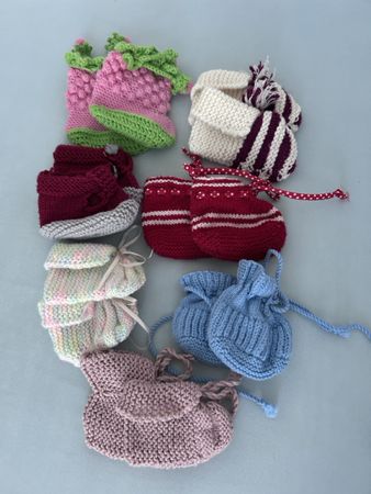 Hand knitted baby booties set of 9 size newborn used
