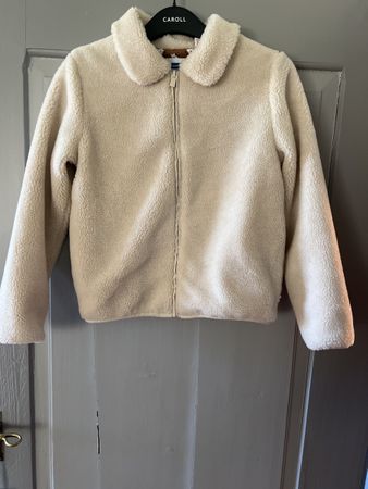 1 blouson Blanc 12 ans en bon état selon photos