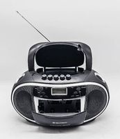 Radio FM, cassette, CD MP3, USB