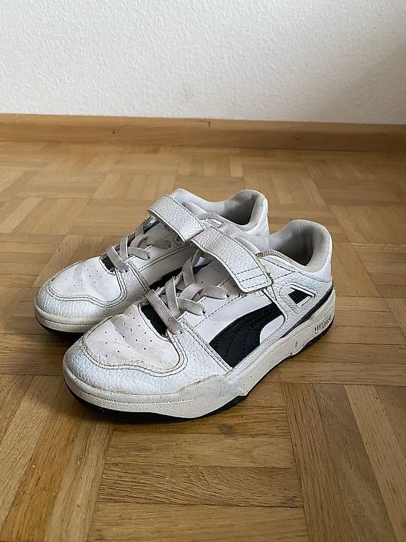 Herrenschuhe: Schwarz-weiße Sneaker | Puma – Gebraucht aus Laufen von Looc_