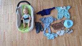 Puppe mit Maxicosy und Kleidung Set gebraucht