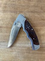 Laguiole Bougna Klappmesser dunkles Holz Metall Verziert