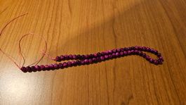 Filo di perline fucsia (nuovo)