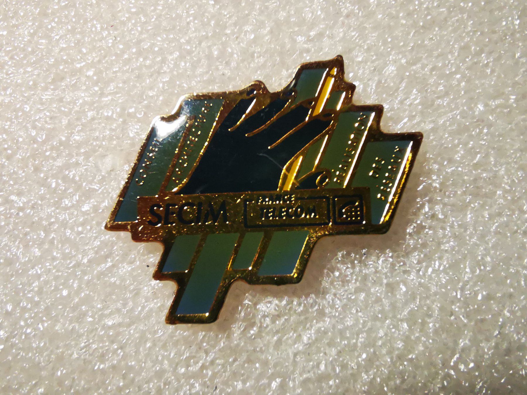 Placchette & Badge: Ansteckpin 7: Secim France Telecom – Usato da Oppligen venduto da Pin-Fall-Shop