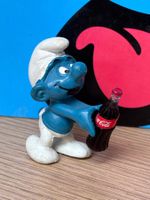 Schlumpf mit Cola-Flasche