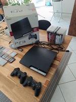 PS3 Slim 160 Go + boîte d'origine + 2 manettes + 11 jeux