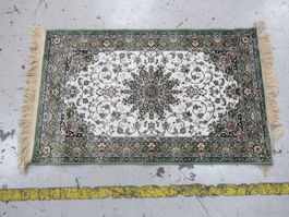 Kleiner Teppich grüntöne
