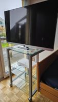 Loewe Art 48 UHD Fernseher inkl. Fernsehmöbel