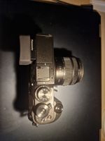 Panasonic Lumix DMC-GX8 avec deux objectifs.