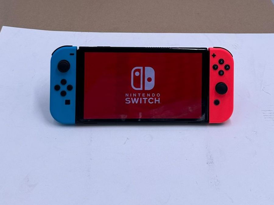 Nintendo Console: NINTENDO Switch OLED-Modell, Neon-Blau/Neon-Rot – Usato da Birmenstorf AG venduto da Distronics_SchweizAG 4