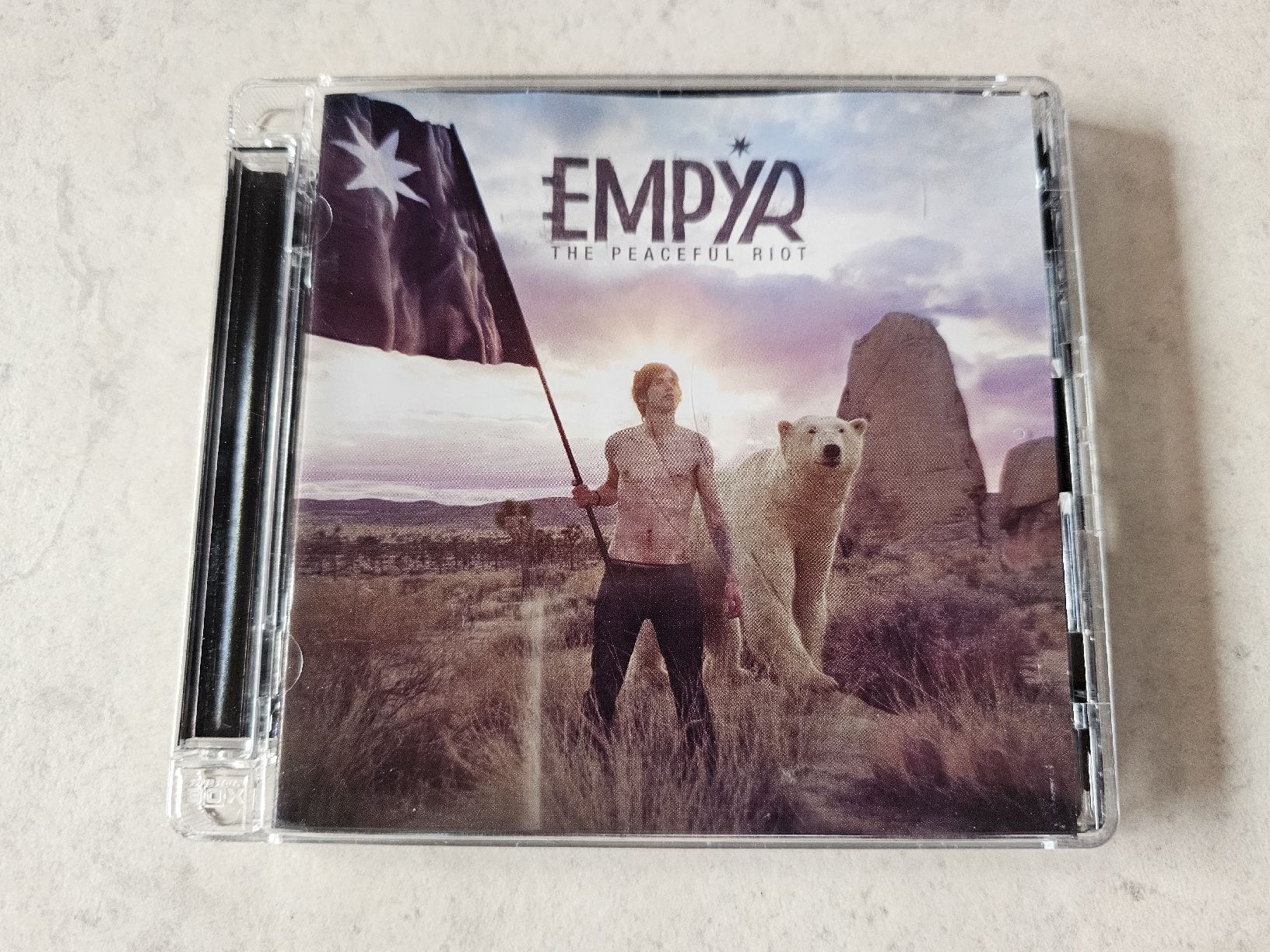 CD: Empyr  -  The Peaceful Riot – Usato da Schneisingen venduto da backstore24
