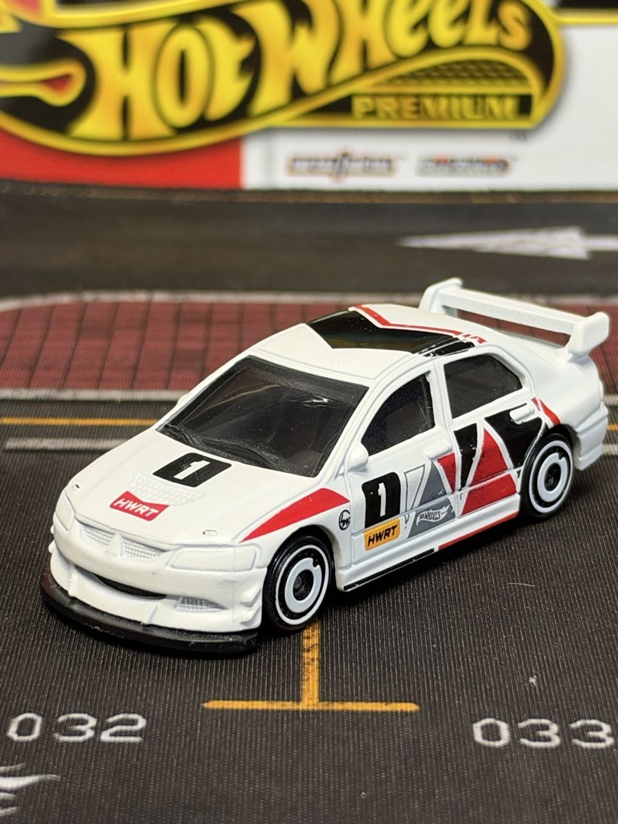 Hot Wheels Modellini d'auto: Hot Wheels Lancer Evolution IX blanc édition premium 1/64 – Usato da rolle venduto da Noma-collectible 1