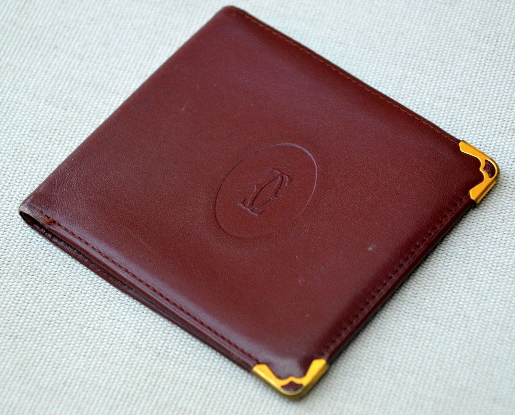 Cartier Portafogli: Portefeuille Cartier – Usato da Collonges venduto da Auganien