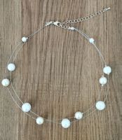 Elegante Perlenkette mit feinen Details für den Sommer