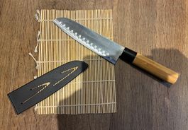 Santoku Messer mit Kullenschliff gebraucht Zustand