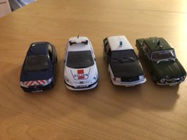 4 defekte Polizei Modellautos (nr.102)