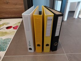 4 schmale Ordner in verschiedenen Farben gebrauchter Zustand