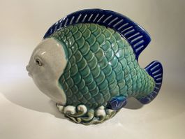 ceramic fish figurine with a blue and green glaze