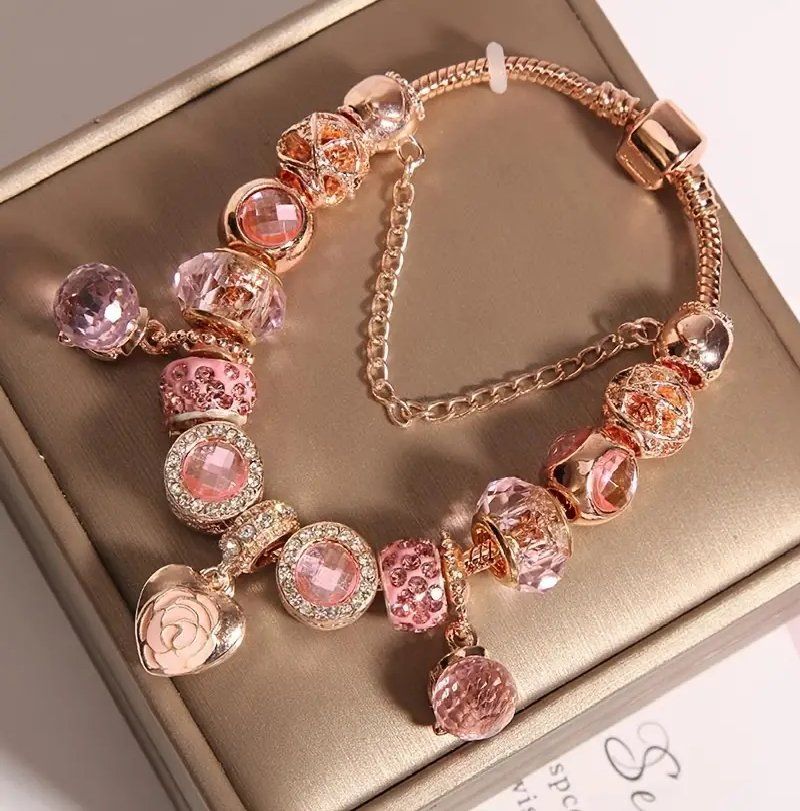 Armbänder & -reifen: Roségoldenes Armband mit Charms – Neu und originalverpackt aus Glattbrugg von majuska01