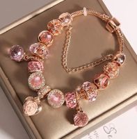 Roségoldenes Armband mit Charms
