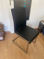 4 Freischwingerstühle schwarz Kunstleder