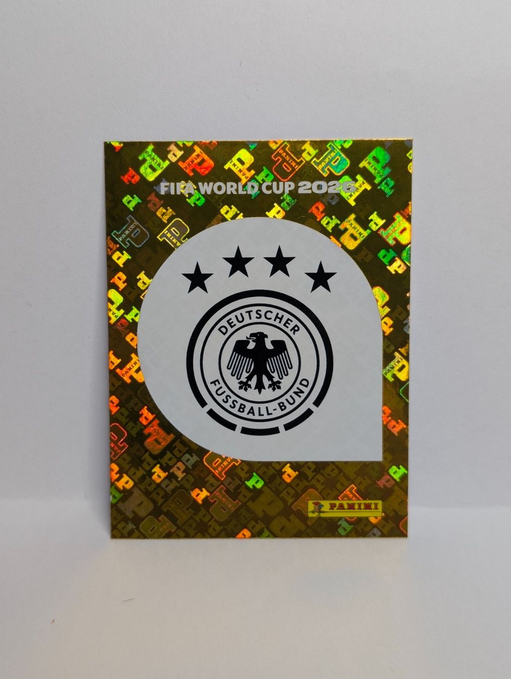 Panini Carte collezionabili: Panini WM 2026 - GER 1 - Emblem GERMANY – Nuovo (secondo la descrizione) da Founex venduto da amel89
