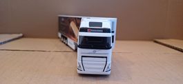 HERPA. VOLVO FH 4X2.TRANSPORT FRIGORIFIQUE.( EMMI ) 1:87.CH.