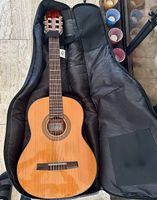 Kindergitarre mit Zubehör in gutem Zustand 