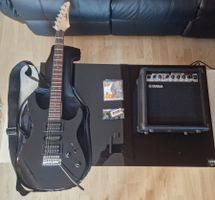 E-Gitarre Yamaha, schwarz mit Verstärker und Zubehör